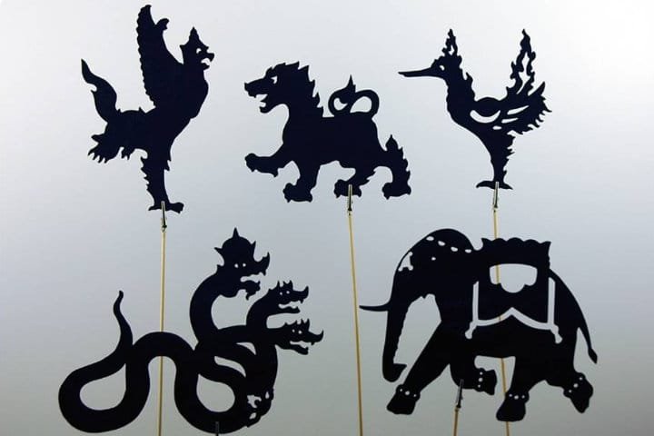 Shadow puppets, flat leather figures whose silhouettes appear on a lit screen