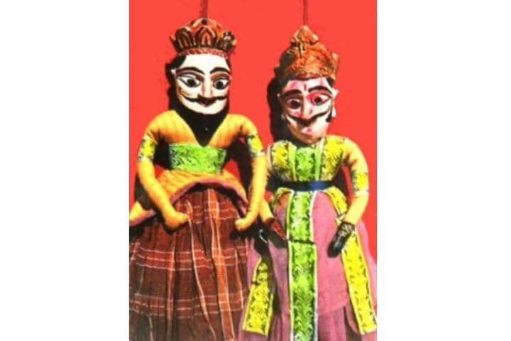 String puppets, or marionettes, controlled by threads from above